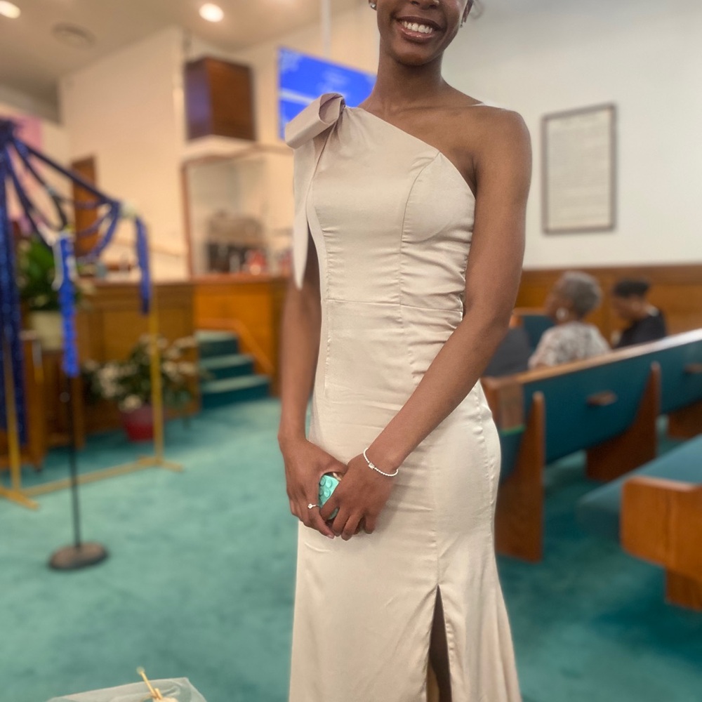 Chic Cream Asymmetrical Dress with Bow Accent